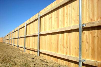 Spruce whitewood wooden fence installation. This photo was taken in Mesquite, TX.