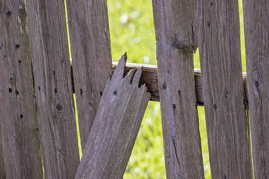 Broken fence. New wooden fence installation. This photo was taken in Mesquite, TX.